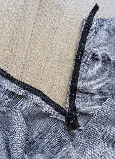 Sew the other edge of the zipper to the other edge of the skirt
