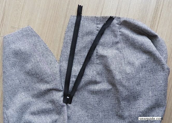 Zipper cut to fit the unstitched opening