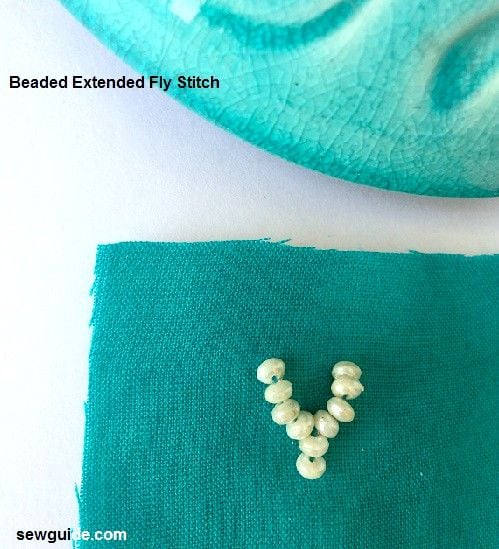 sewing bead work on fabric
