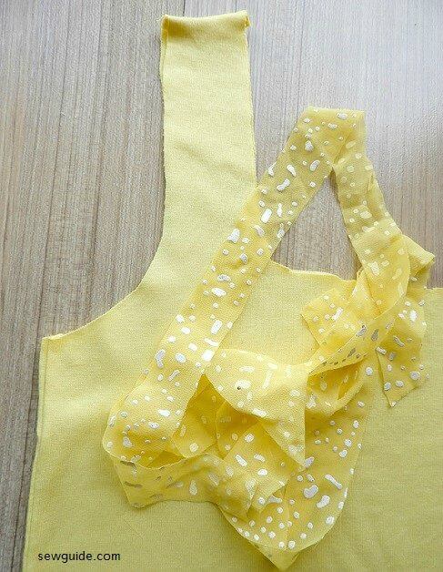 use bias binding tape or fabric strip to bind the cut out t-shirt edges