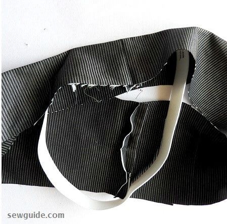 insert the elastic tube inside the waistband fabric