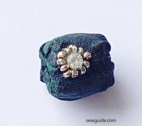 wooden bead covered with fabric 