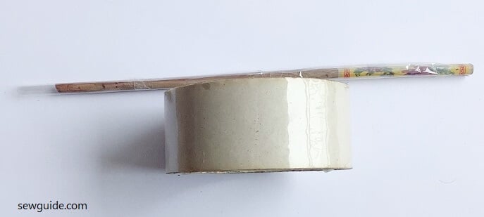 stitch plastic film on chopsticks - to make plastic stick for beads with fabric 