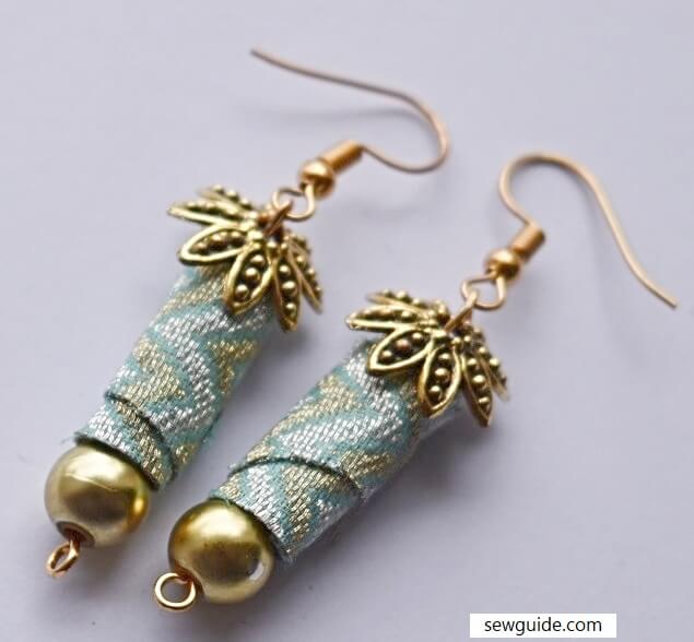 make fabric bead earring by hanging earring finidings on eyepins 