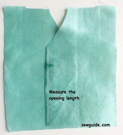 stitch the edges of the front bodice of the kimono = measure the opening length