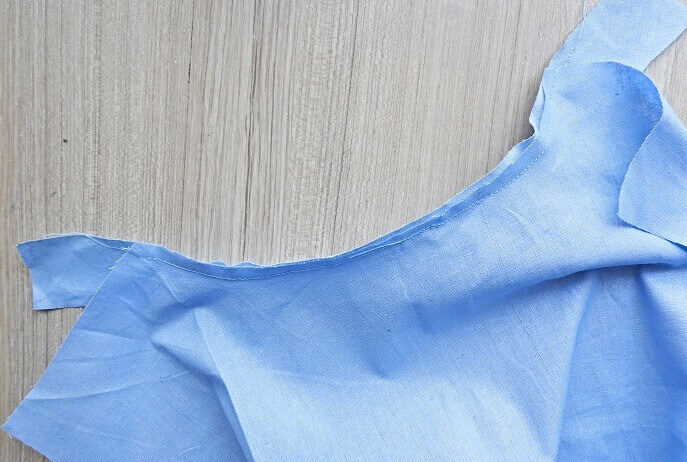 The back neckline of the kurta tunic bound with the bias binding tape