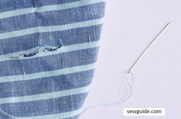 how to repair tears on linen fabric of a shirt