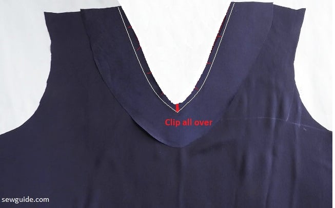 The seam allowance clipping marks at the neckline for smooth turning 