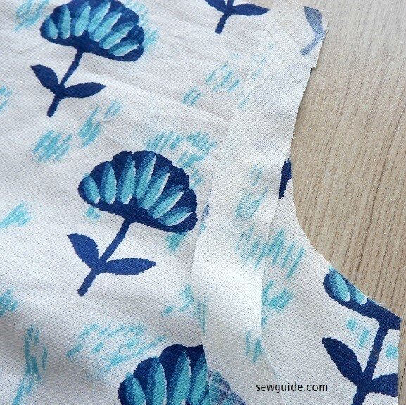 bind the armhole with bias tape