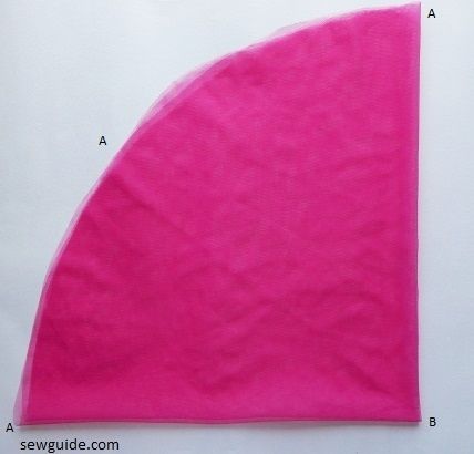 fold and cut tulle fabric in a circle shape